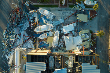 Boat station destroyed by hurricane wind in Florida coastal area. Consequences of natural disaster