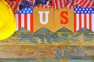 Celebration Labor Day with safety gear flag United States of America on rustic wooden background