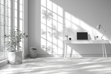 A simple, white desk with a single laptop and a clean surface, illustrating the streamlined nature of digital business operations.