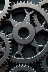Close-up of Metallic Gears on Dark Background