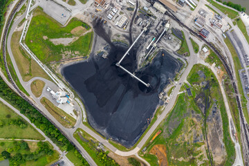 Electric energy production from fossil fuel. Large coal stack at Kingston power station in Roane County, Tennessee. Major coal-fired power plant producing electricity