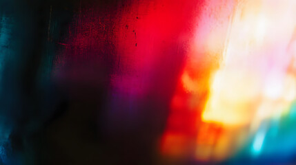 Abstract colorful grainy background imitating light leak on photographic film.