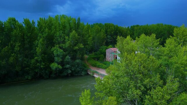Spring landscape of the riverside forest on the Esla River. Aerial view from a drone in the village of Bret&oacute;. Province of Zamora. Castile and Leon. Spain. Europe