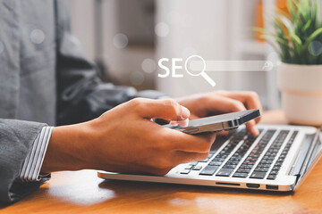SEO Search Engine, Businessman use laptop to analyze SEO search engine optimization for promoting...