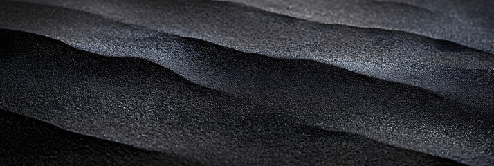 Obraz premium Black or dark gray rough grainy sand texture background