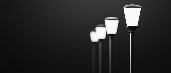 A row of elegant street lamps illuminates a dark background, creating a serene and atmospheric nighttime scene.