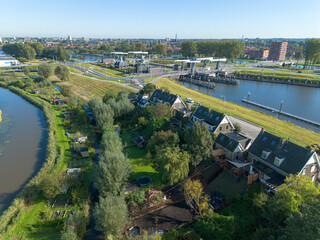 Fototapeta premium Double lock Julianasluis with drawbridges between the Gouwekanaal and Hollandsche IJssel rivers near Gouda