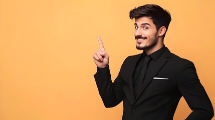 Businessman wear classic formal black suit shirt tie work in office point index finger aside on area isolated on plain yellow background studio portrait.Copy space at his hand for promotion and advert