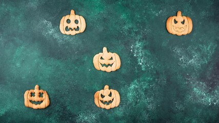 Halloween pumpkin cookies in shape of jack-o-lantern