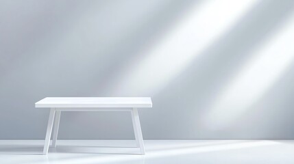 Minimalistic white table against a soft grey background, illuminated by gentle light rays, creating a serene and modern atmosphere.