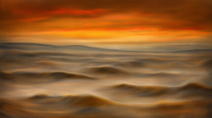 Fototapeta premium A stunning golden sunset casting warm light over rolling clouds, creating a serene and dreamlike skyscape