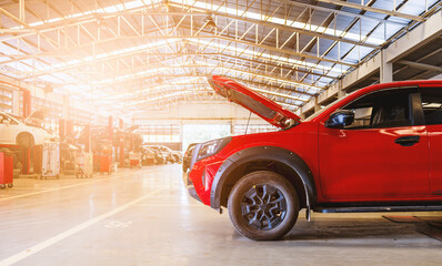 Car Maintenance Technician Working on Engine