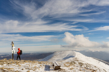 Lone Hiker on the Winter Peak of Połonina Caryńska
