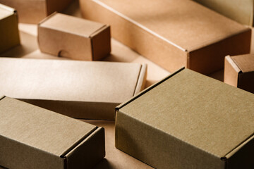 Multiple cardboard boxes arranged on a surface for packaging and shipping in a warehouse setting