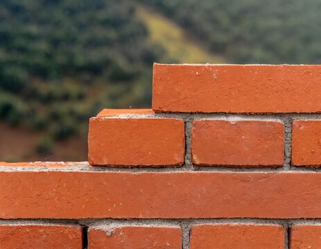 Fototapeta Red bricks wall in construction with blurred background background