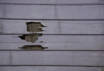 
Old wood siding shows signs of decay over time if ignored.
