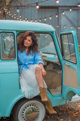 Beautiful mix European half Latina woman in blue shirt and white skirt, tender lady outdoor...