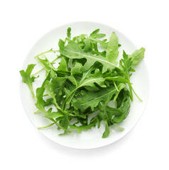 Plate with fresh arugula leaves isolated on white, top view