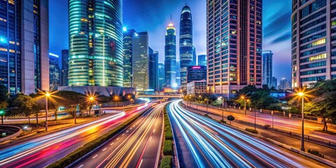 Fototapeta premium Vibrant City Road with Skyscrapers and Car Traffic Light Trails at Night, Infrastructure and Transport