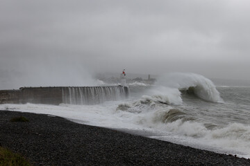 Newlyn harbour crashing waves
