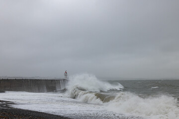 Newlyn harbour crashing waves