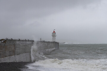 Newlyn harbour crashing waves