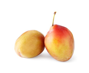 Two fresh ripe plums isolated on white
