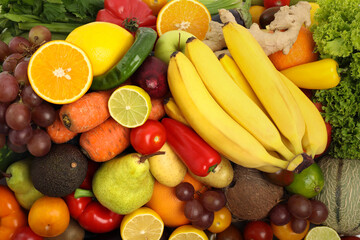 Many different fruits and vegetables as background, top view