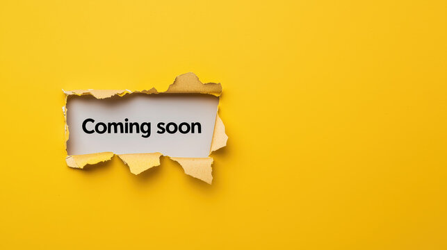 Coming soon is prominently displayed on torn piece of paper against bright yellow background, creating engaging and anticipatory visual