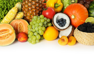 Different fresh vegetables and fruits isolated on white