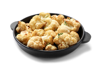 Baked cauliflower in baking dish on white background