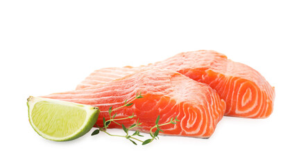 Pieces of fresh salmon, lime and thyme isolated on white