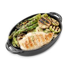 Delicious grilled vegetables and chicken breast in baking dish isolated on white