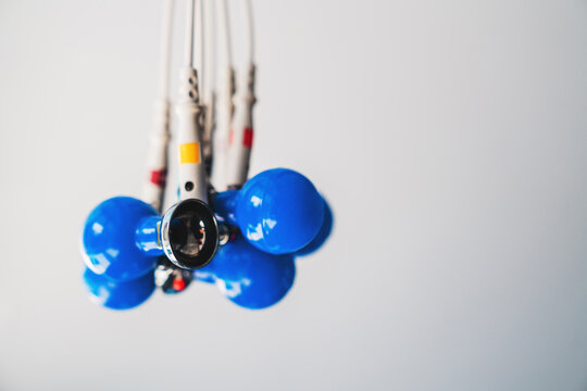 Close up of sensors electrodes with suction cups over background