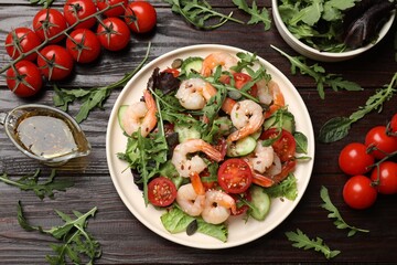 Delicious shrimp salad and ingredients on wooden table, flat lay