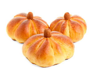 Tasty pumpkin shaped buns isolated on white