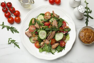 Delicious fresh tuna salad on white table, flat lay