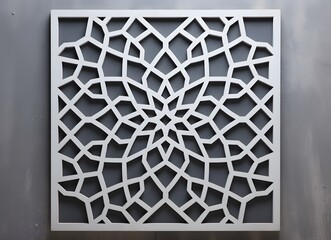 Naklejka premium Laser Cut Islamic Geometric Pattern on Concrete Wall