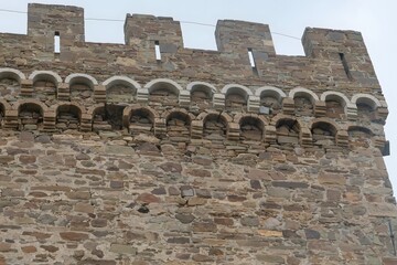 Stone fortress against the sky in close-up
