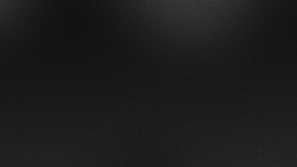 A gradient background in black and grey tones with a grainy noise texture effect, ideal for web banners and poster designs.