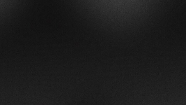 A gradient background in black and grey tones with a grainy noise texture effect, ideal for web banners and poster designs.