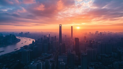 Fototapeta premium Stunning sunset over Shanghai skyline with river view and urban architecture during golden hour