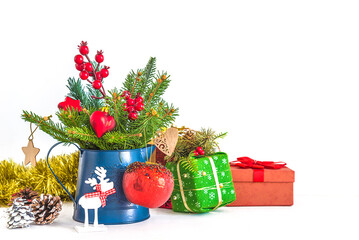 Christmas decoration with gift boxes and holly berry on white background