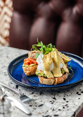 Avocado-poached eggs with a spicy chorizo. Brunch food.