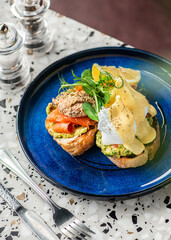 Avocado-poached eggs with a spicy chorizo. Brunch food.