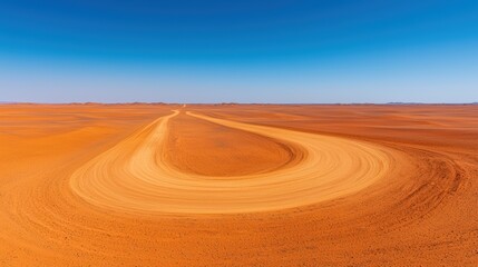 Naklejka premium Serpentine Trail in an Expansive Desert Landscape