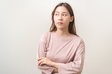 Obraz premium Portrait of positive thinking, pretty asian young woman wear casual style clothing looking away empty think about creative in future, thoughtful plan expression face guess and unsure have a question.