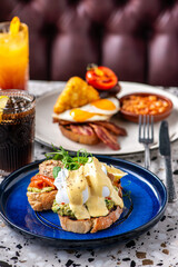 Avocado-poached eggs with a spicy chorizo. Brunch food.