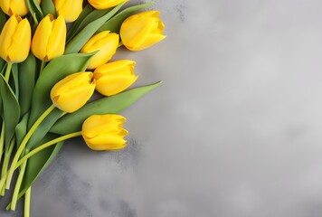 Obraz premium Yellow Tulips Bouquet on Gray Background