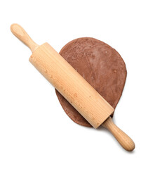 Chocolate dough and wooden rolling pin isolated on white, top view